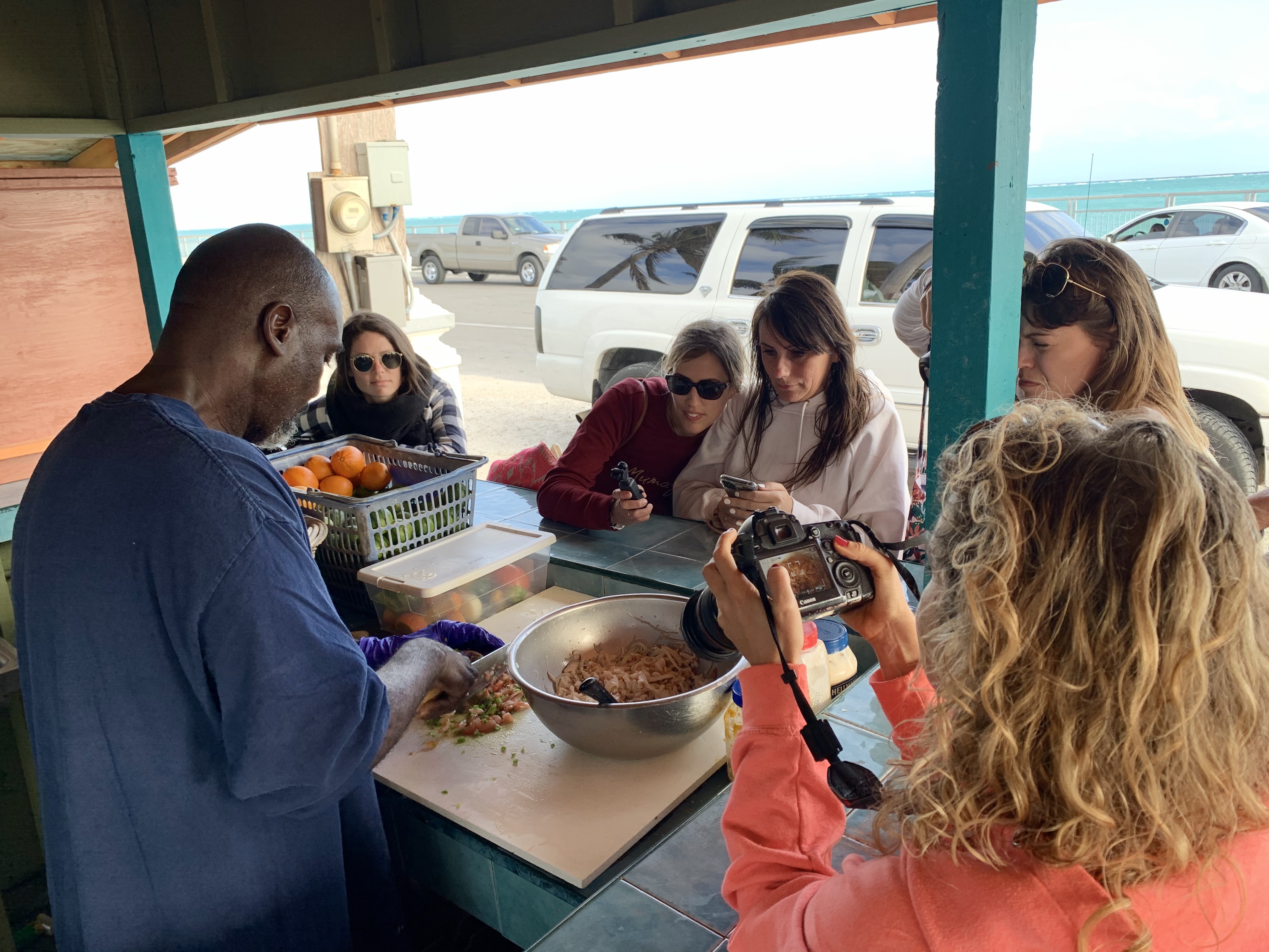 Terry of Terry’s Conch Stand in Smith’s Point shows his guests how he makes his signature conch salad.