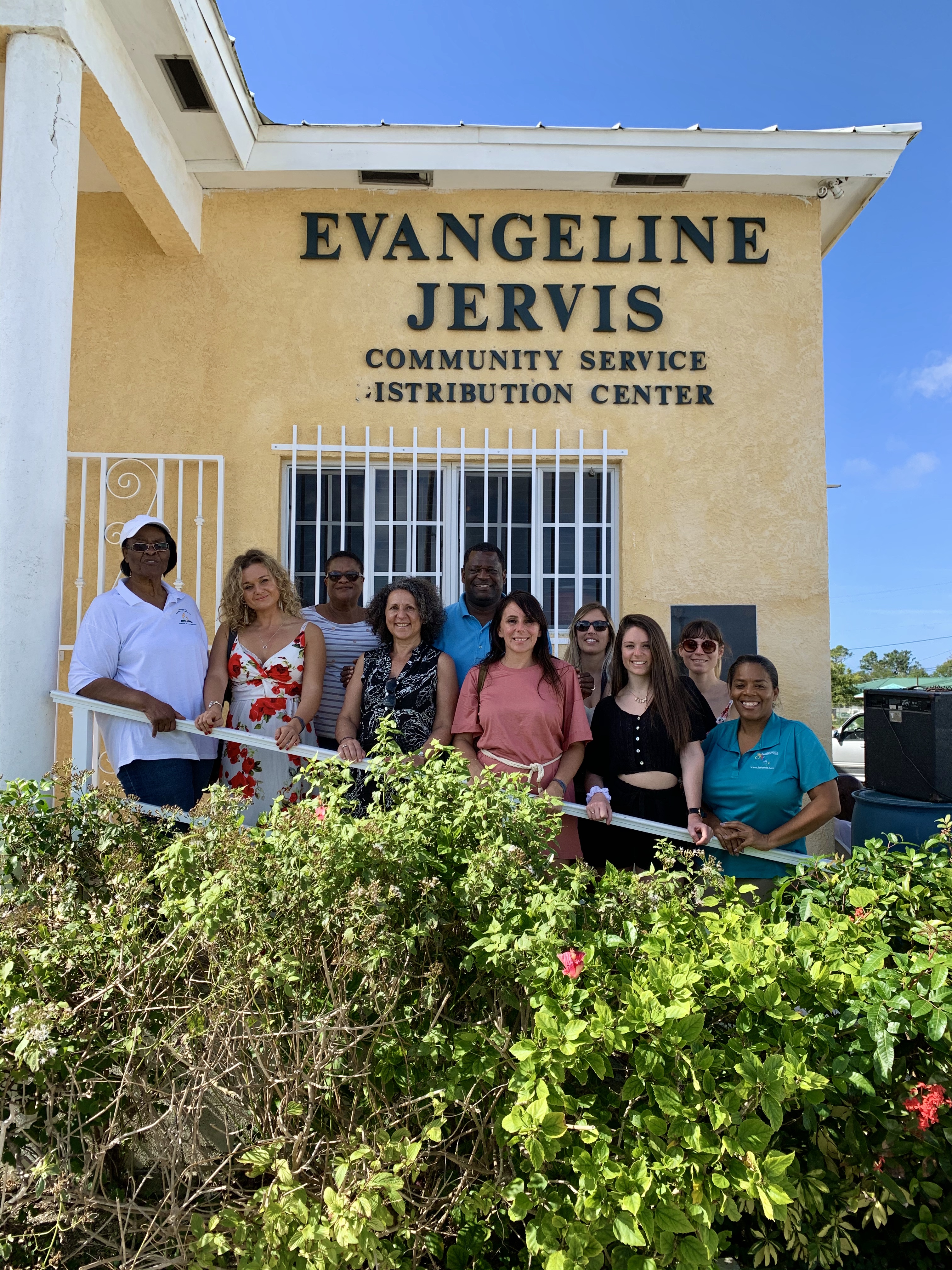 The group of French influencers visited the Evangeline Jervis Community Service Distribution Centre to learn about areas of need on the island and how visitors are able to assist. Here the group is pictured with BMOTA representatives and members of the Fr