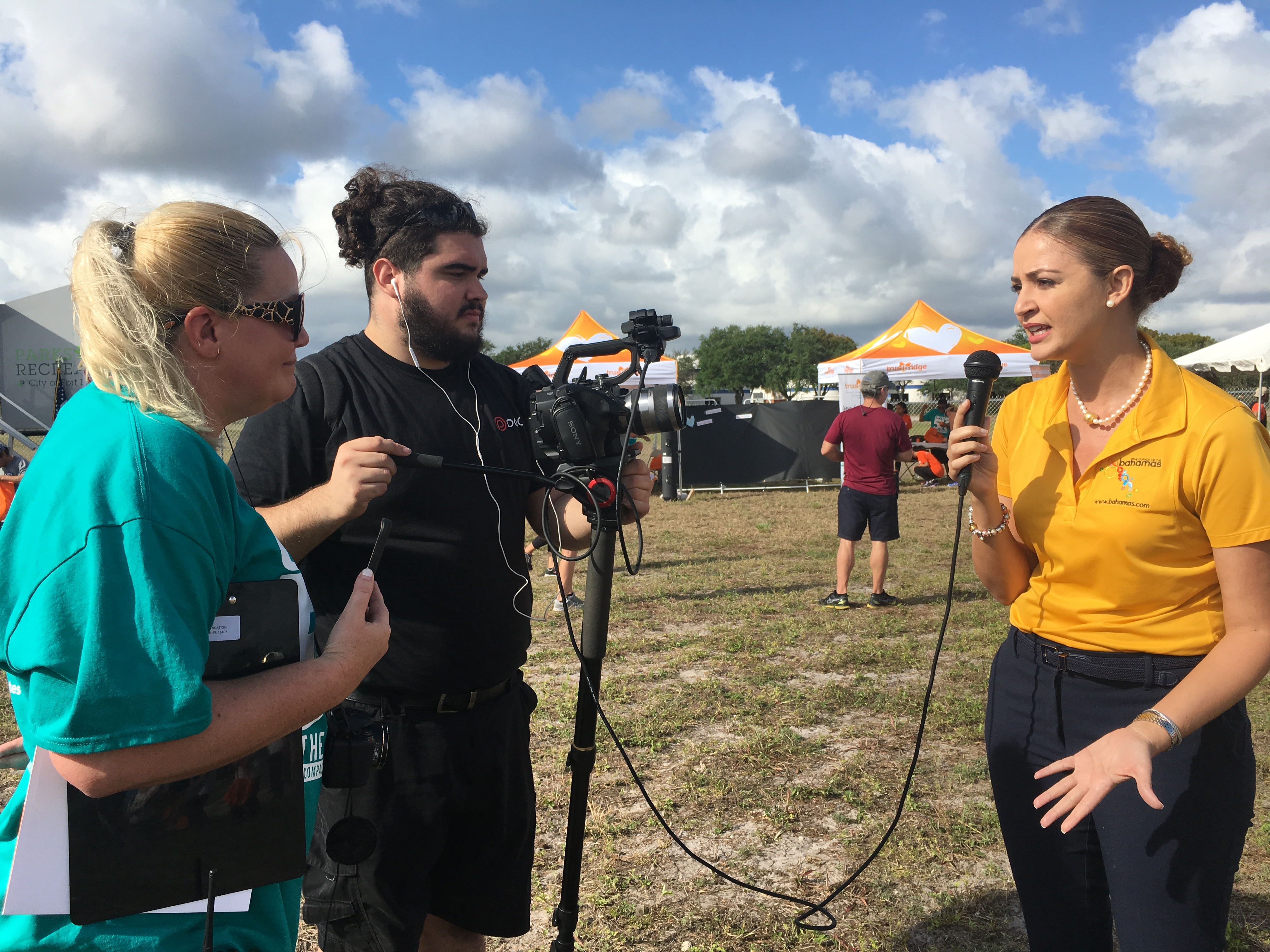 District Manager BTO Florida Office being Interviewed at 5k on the runway race