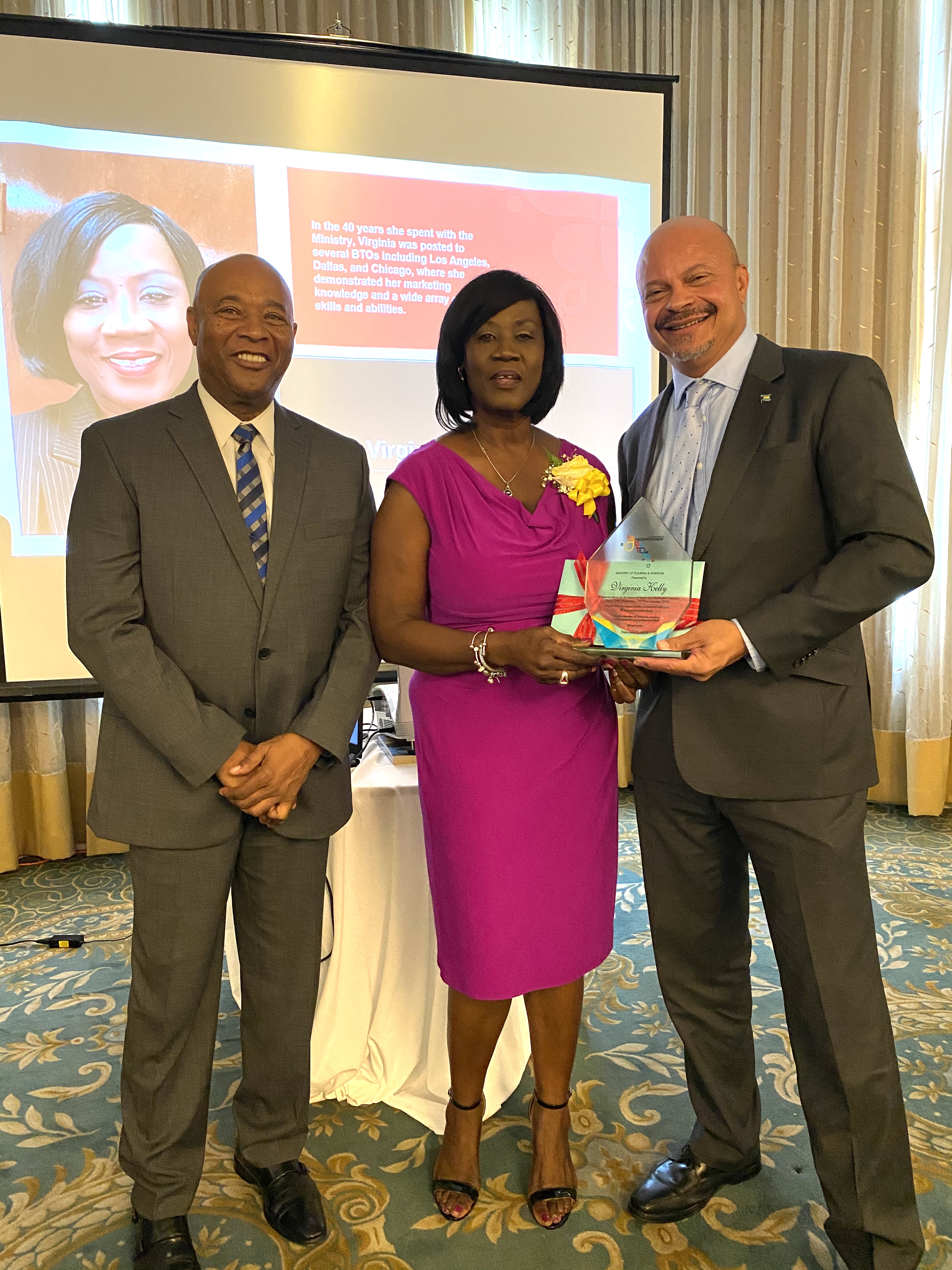 Honouree Virginia Kelly   along with BMOTA Permanent Secretary Charles Albury and Deputy Director General, Ellison "Tommy" Thompson 