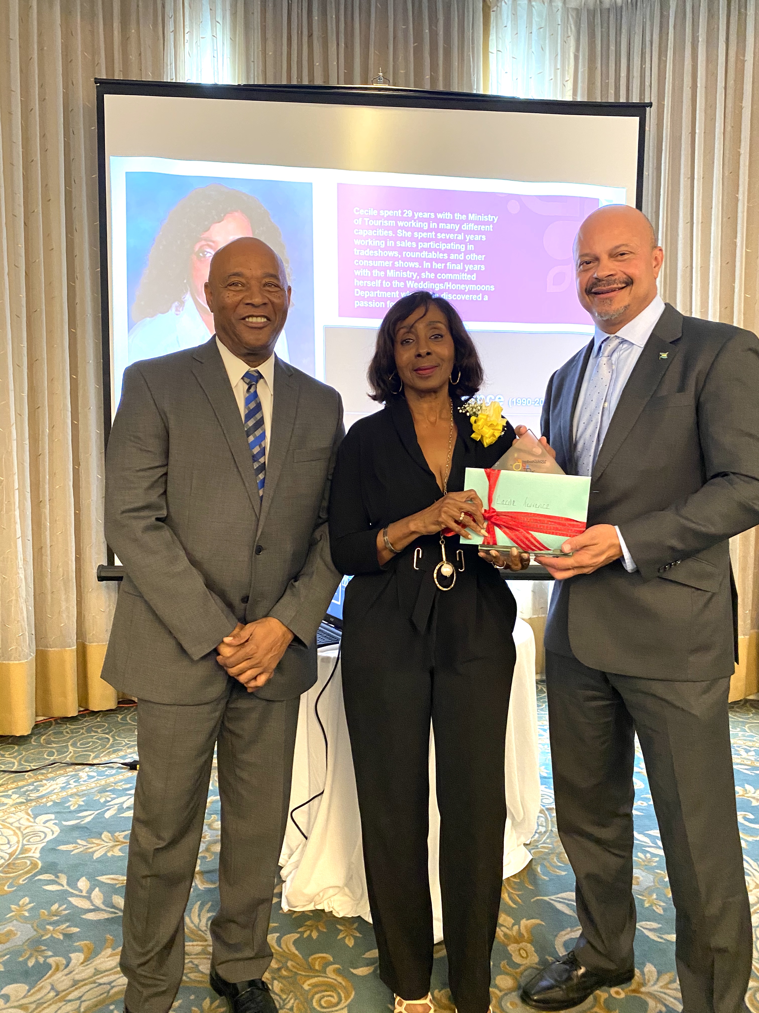 Honouree Cecile Torrence along with BMOTA Permanent Secretary Charles Albury and Deputy Director General, Ellison "Tommy" Thompson 