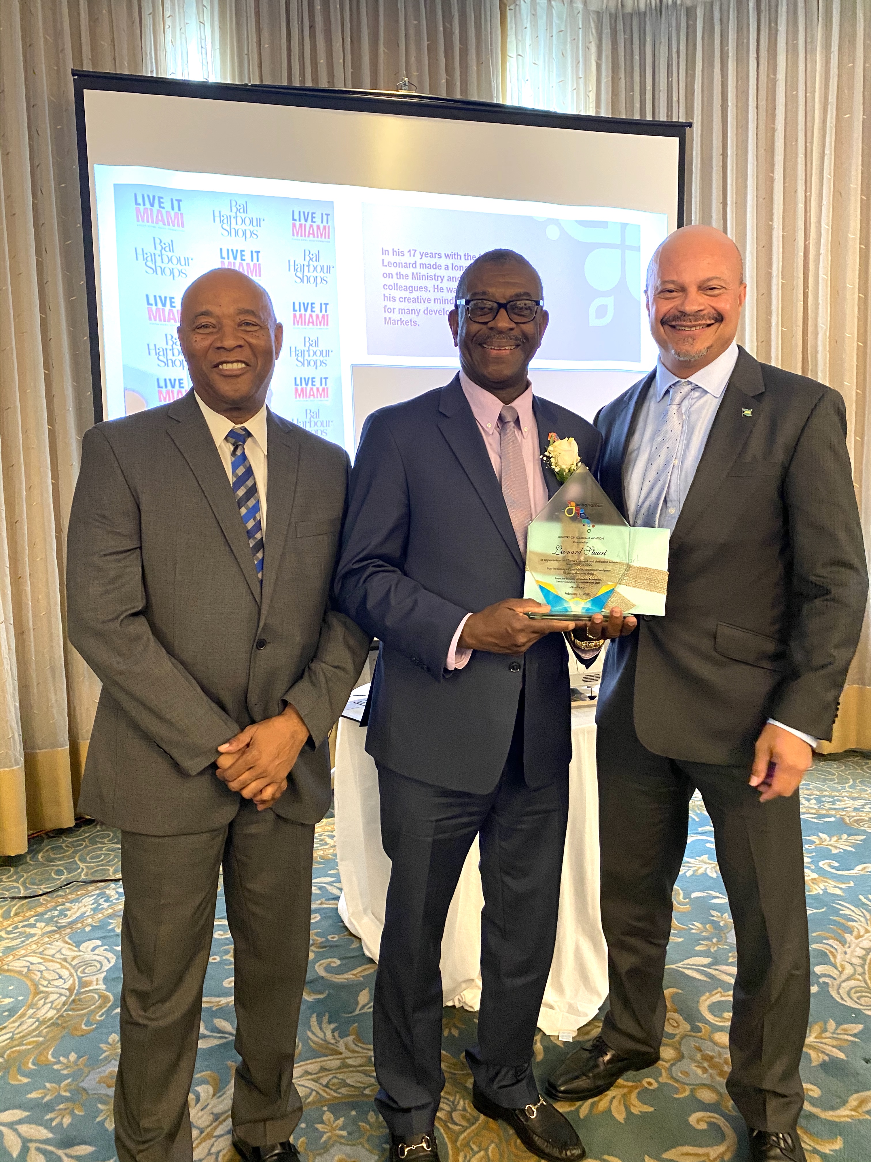 Honouree Leonard Stuart along with BMOTA Permanent Secretary Charles Albury and Deputy Director General, Ellison "Tommy" Thompson