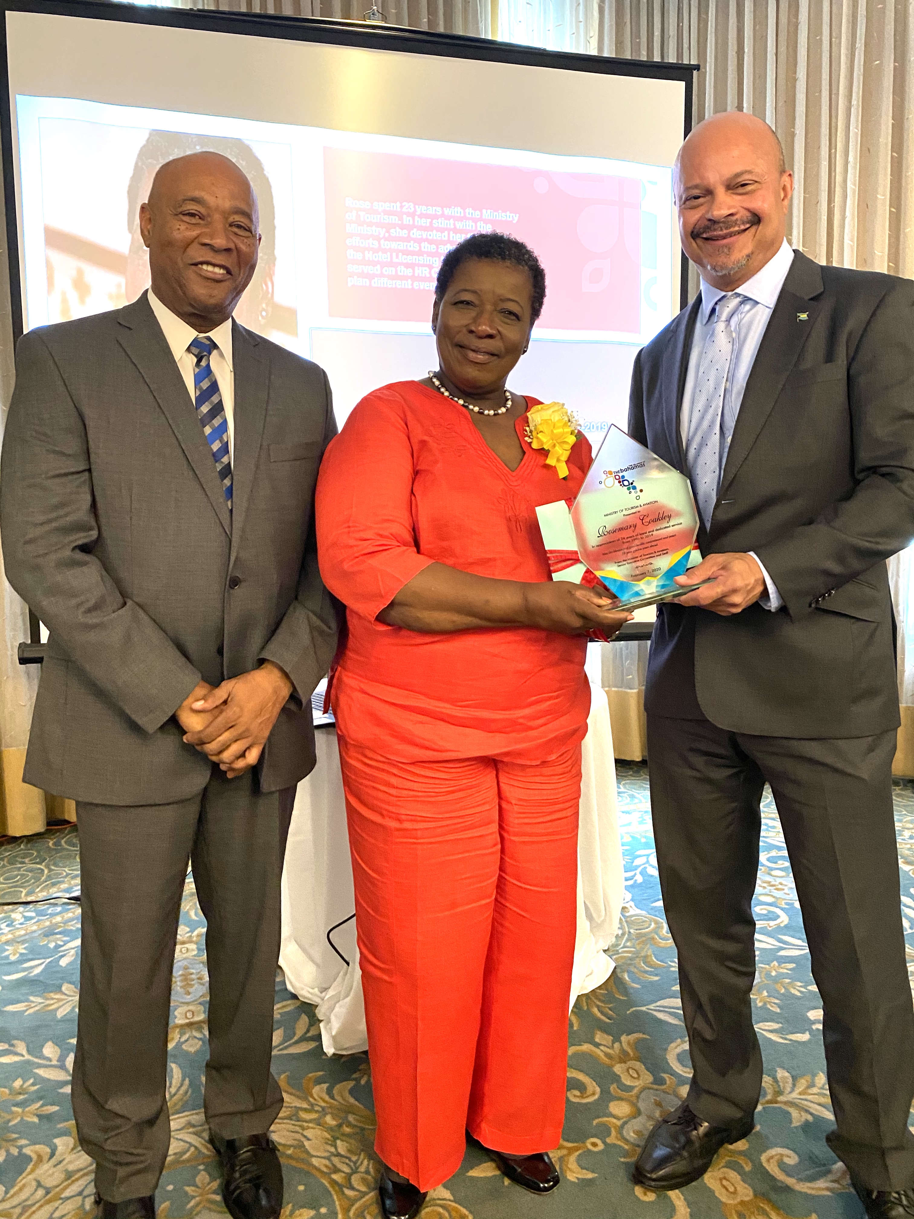  Honouree Rosemary Coakley along with BMOTA Permanent Secretary Charles Albury and Deputy Director General, Ellison "Tommy" Thompson 